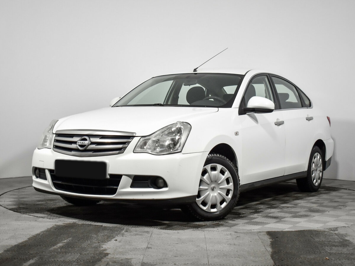 Nissan Almera 2013 года с пробегом. Посмотреть фото