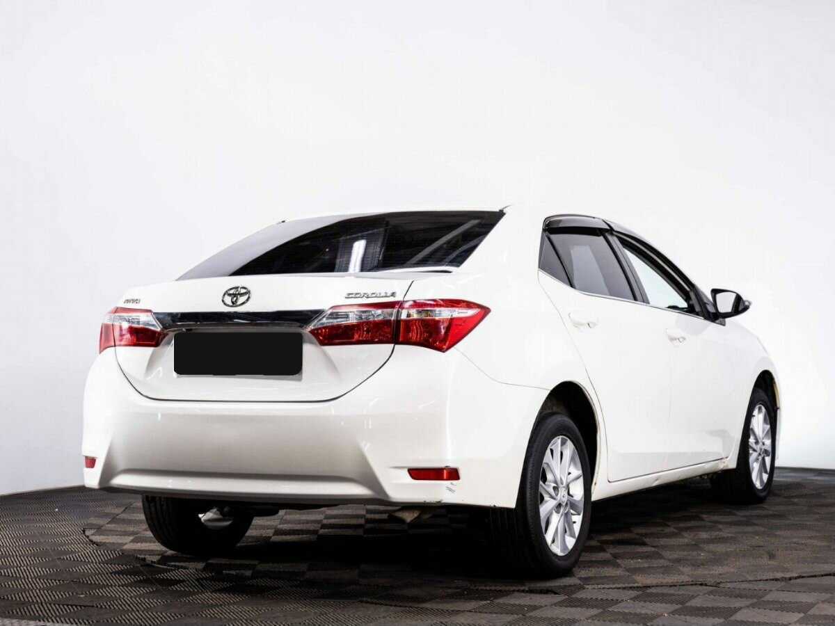 Toyota Corolla 2013 года с пробегом. Фото: #5