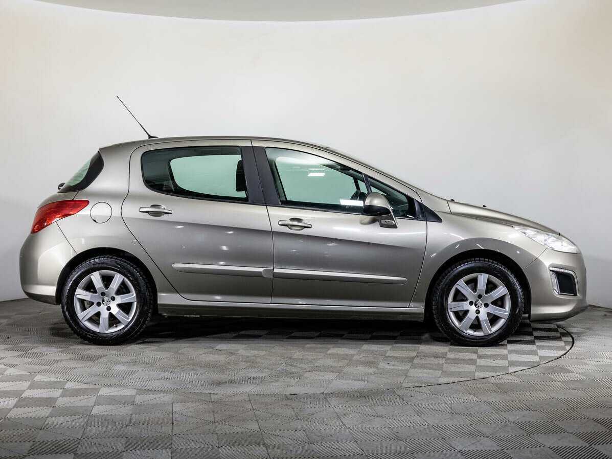 Peugeot 308 2013 года с пробегом. Фото: #3