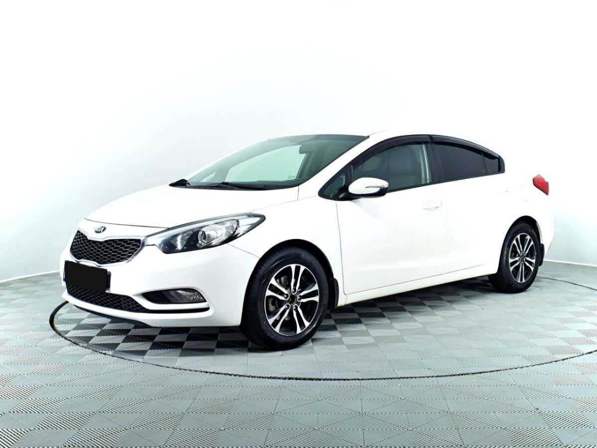 Kia Cerato 2014 года с пробегом. Посмотреть фото