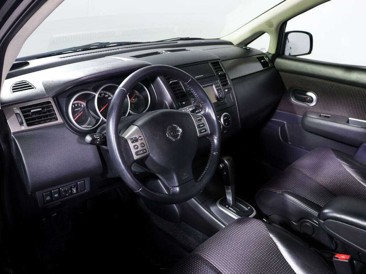 Nissan Tiida 2012 года с пробегом. Фото: #13