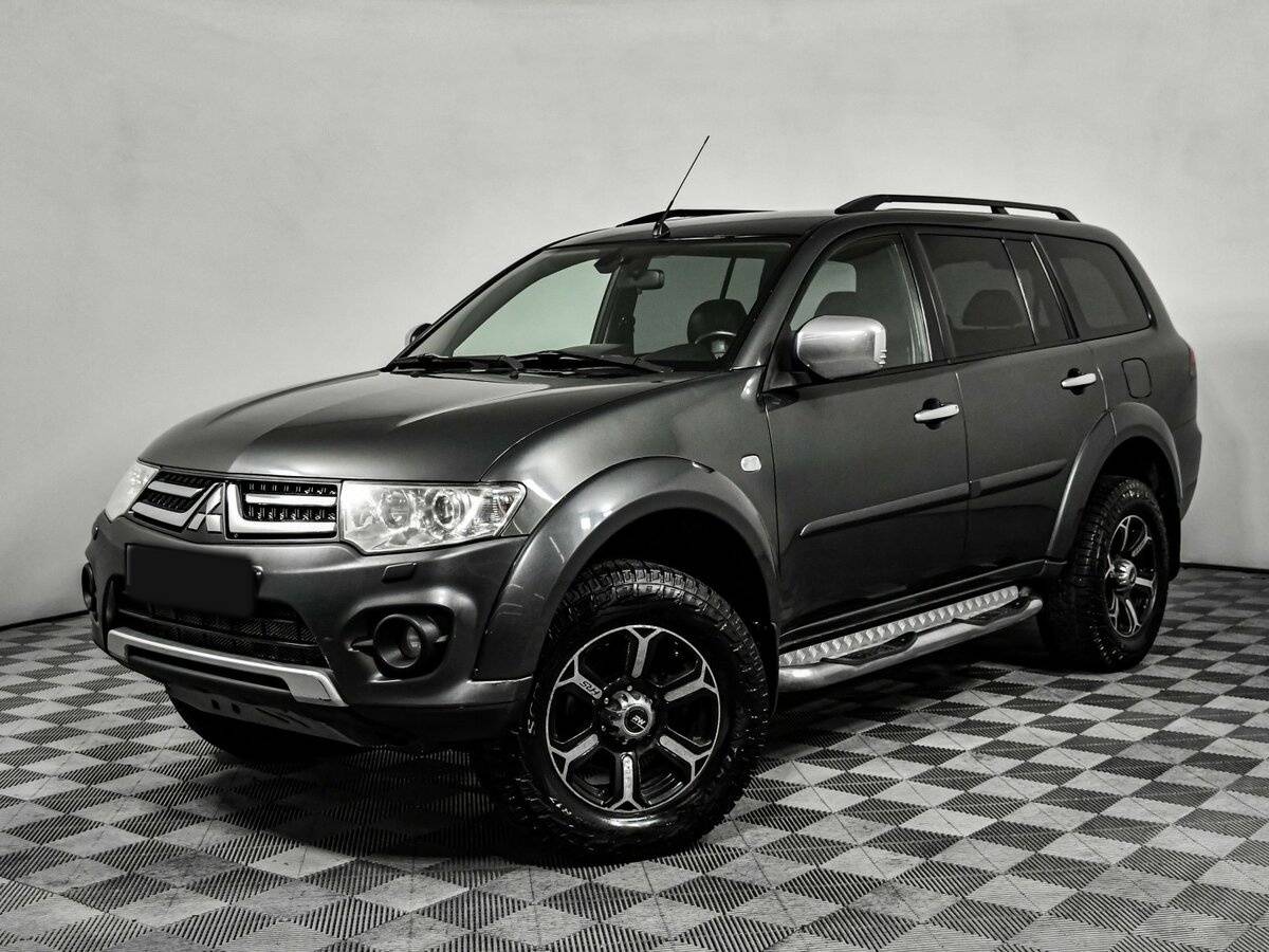 Mitsubishi Pajero Sport 2013 года с пробегом. Посмотреть фото