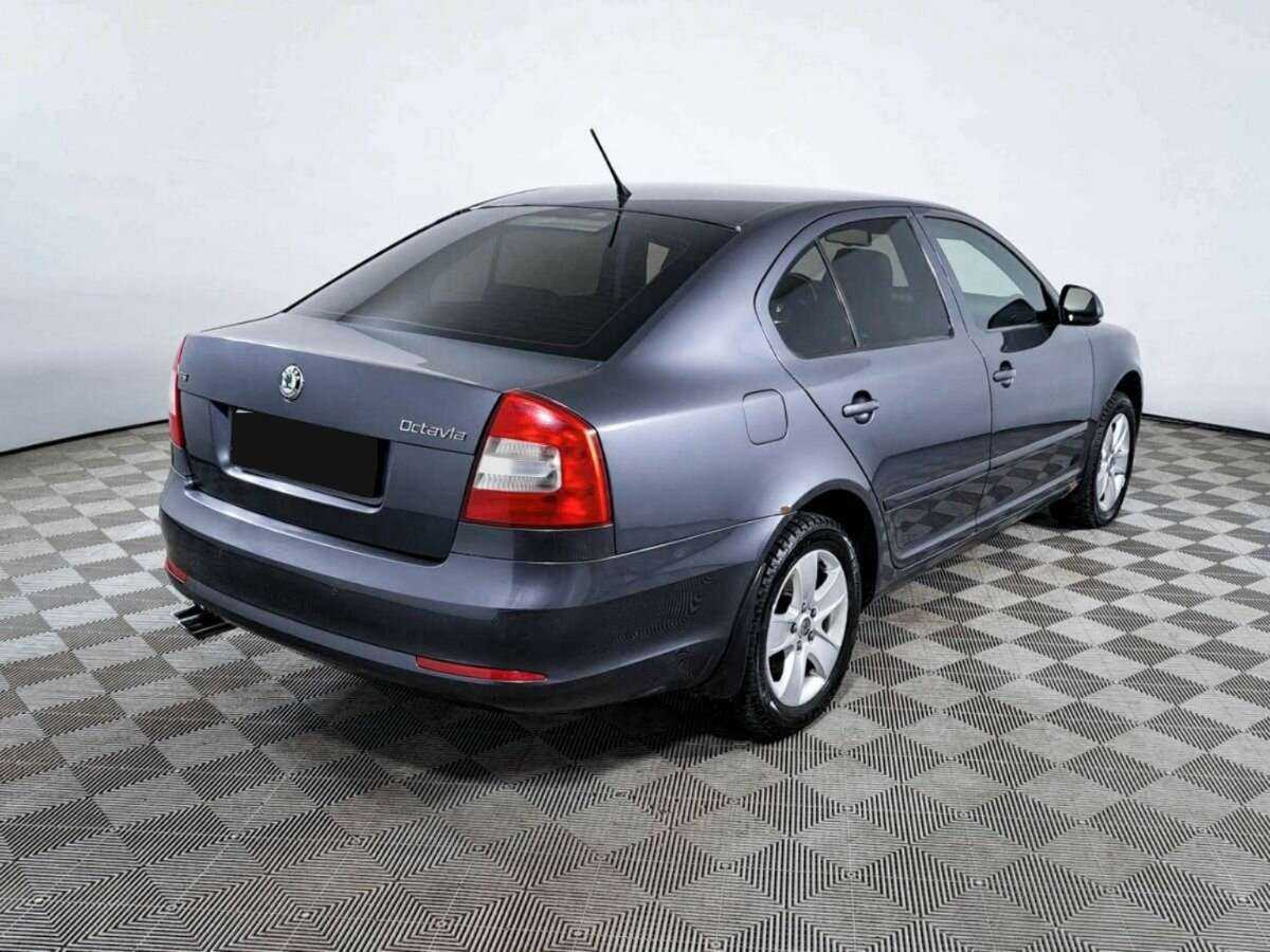 Skoda Octavia 2012 года с пробегом. Фото: #4