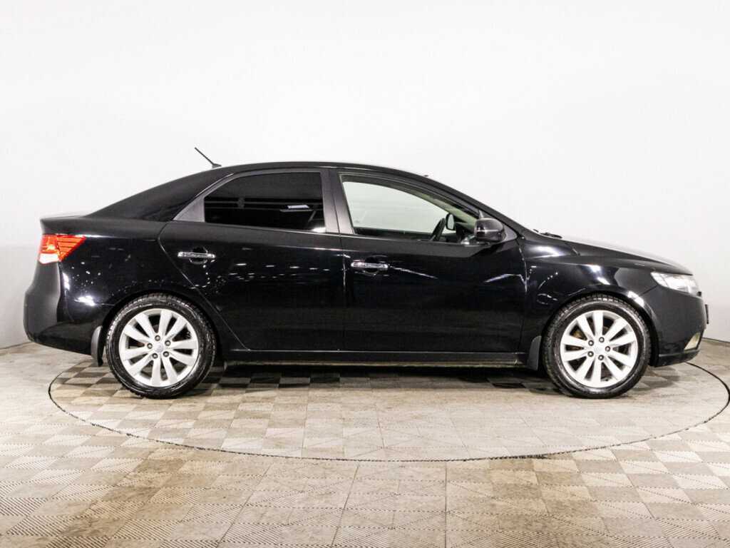 Kia Cerato 2012 года с пробегом. Фото: #3