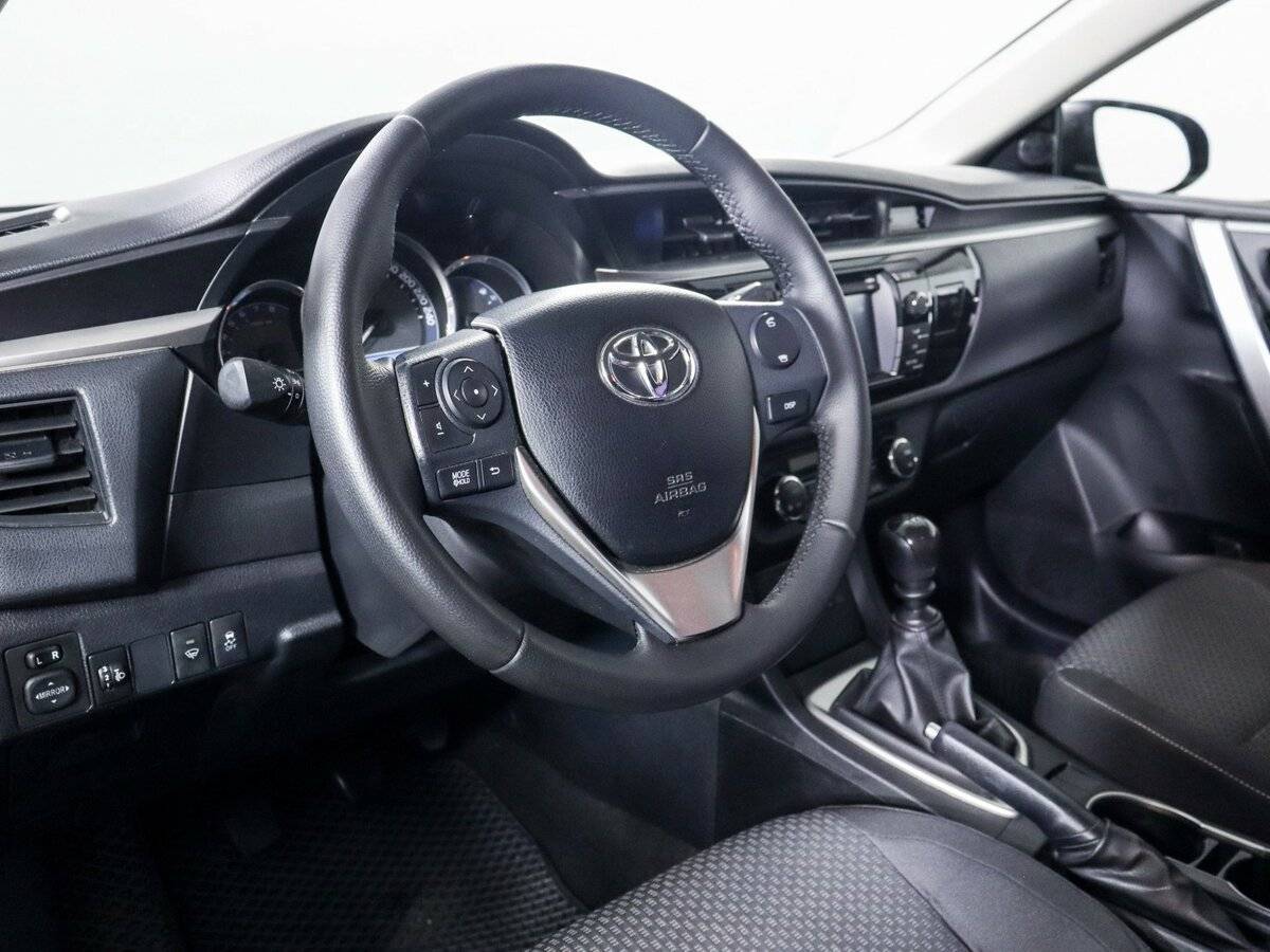 Toyota Corolla 2014 года с пробегом. Фото: #10