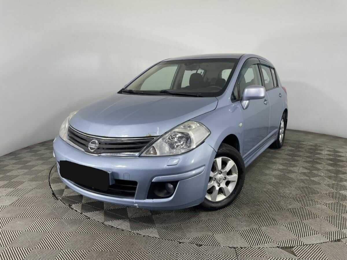 Nissan Tiida 2013 года с пробегом. Посмотреть фото