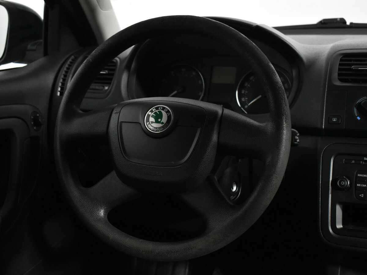 Skoda Fabia 2012 года с пробегом. Фото: #11
