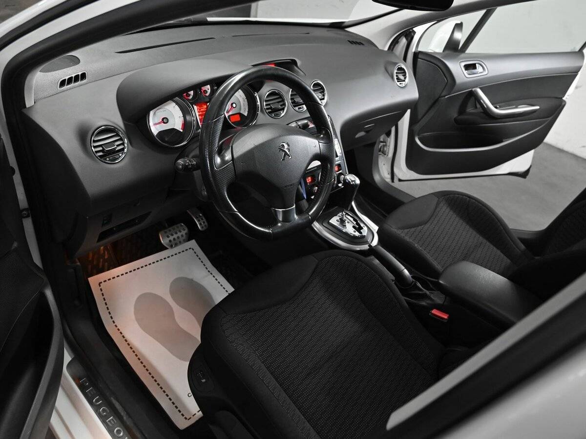 Peugeot 308 2012 года с пробегом. Фото: #8