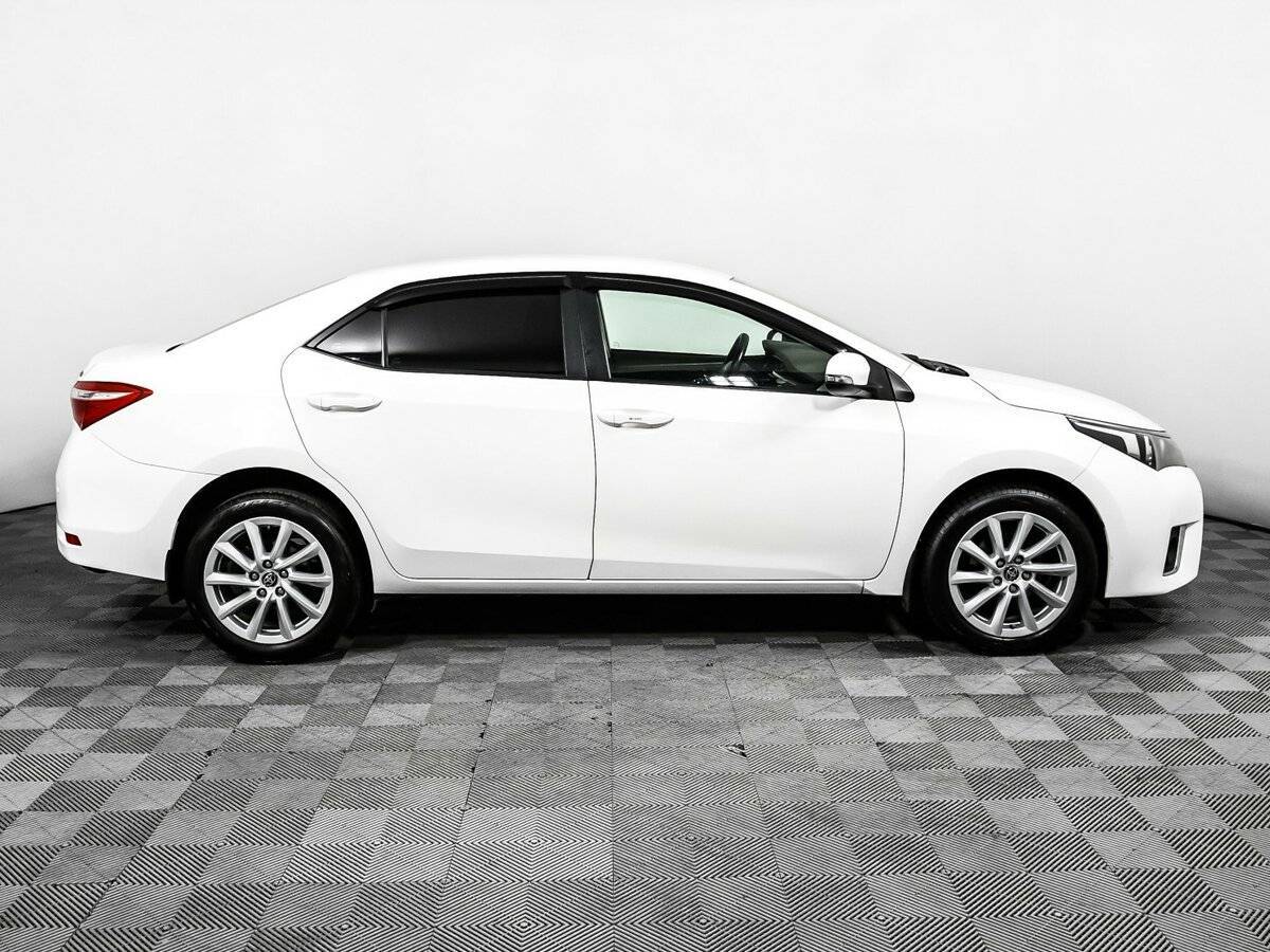 Toyota Corolla 2013 года с пробегом. Фото: #3