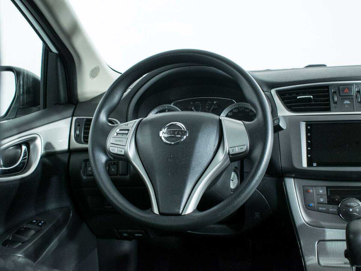 Nissan Tiida 2015 года с пробегом. Фото: #13