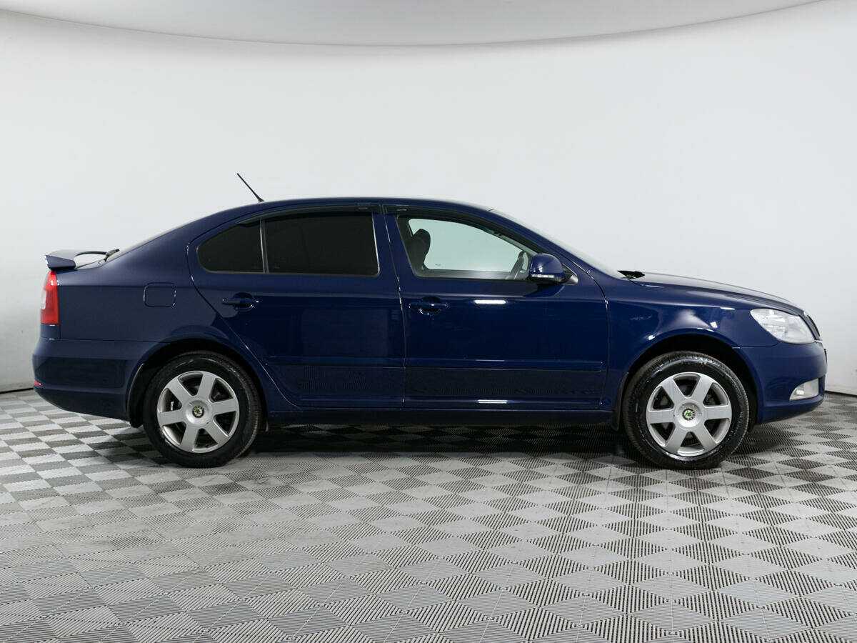 Skoda Octavia 2012 года с пробегом. Фото: #3