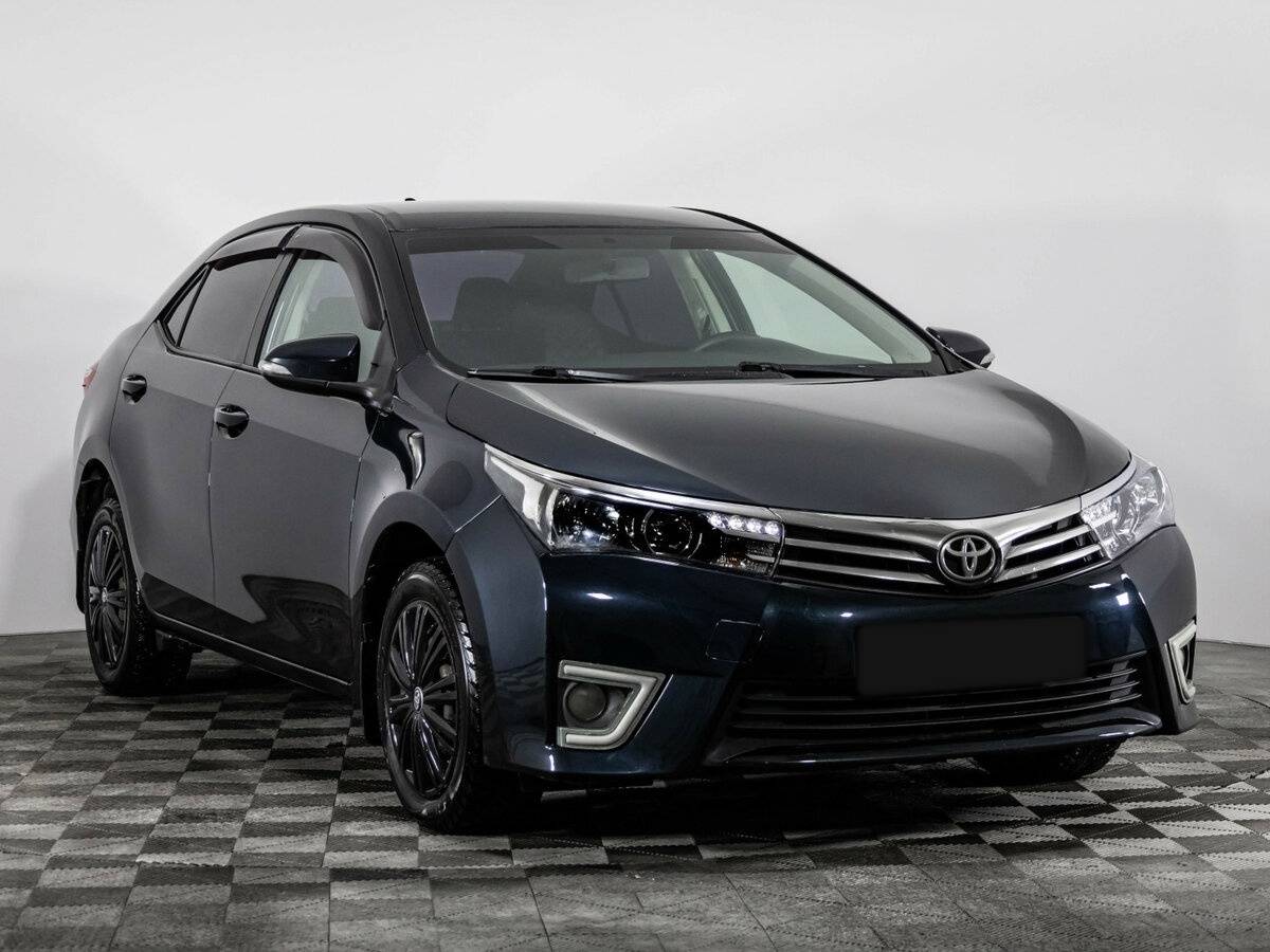 Toyota Corolla 2014 года с пробегом. Фото: #2