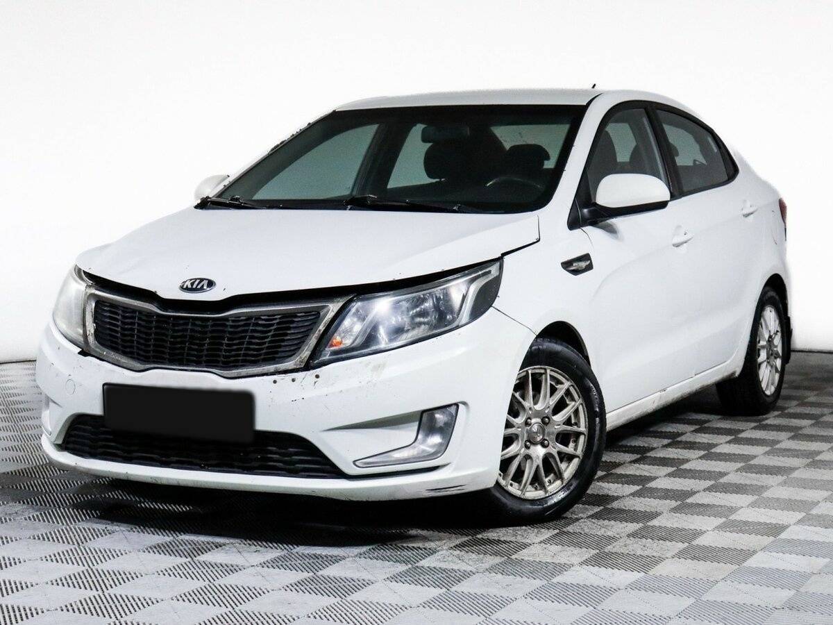Kia Rio 2013 года с пробегом. Посмотреть фото