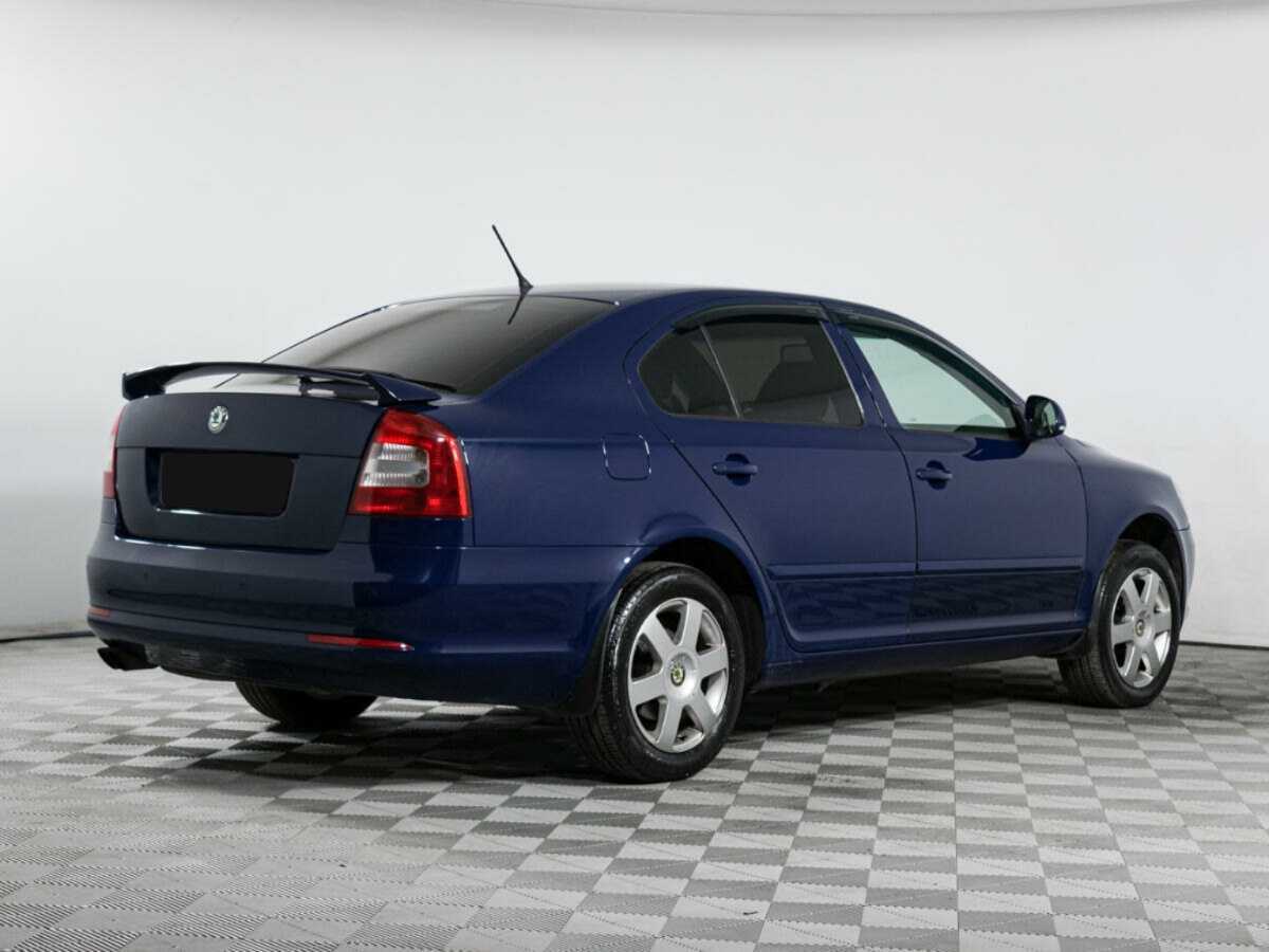 Skoda Octavia 2012 года с пробегом. Фото: #4