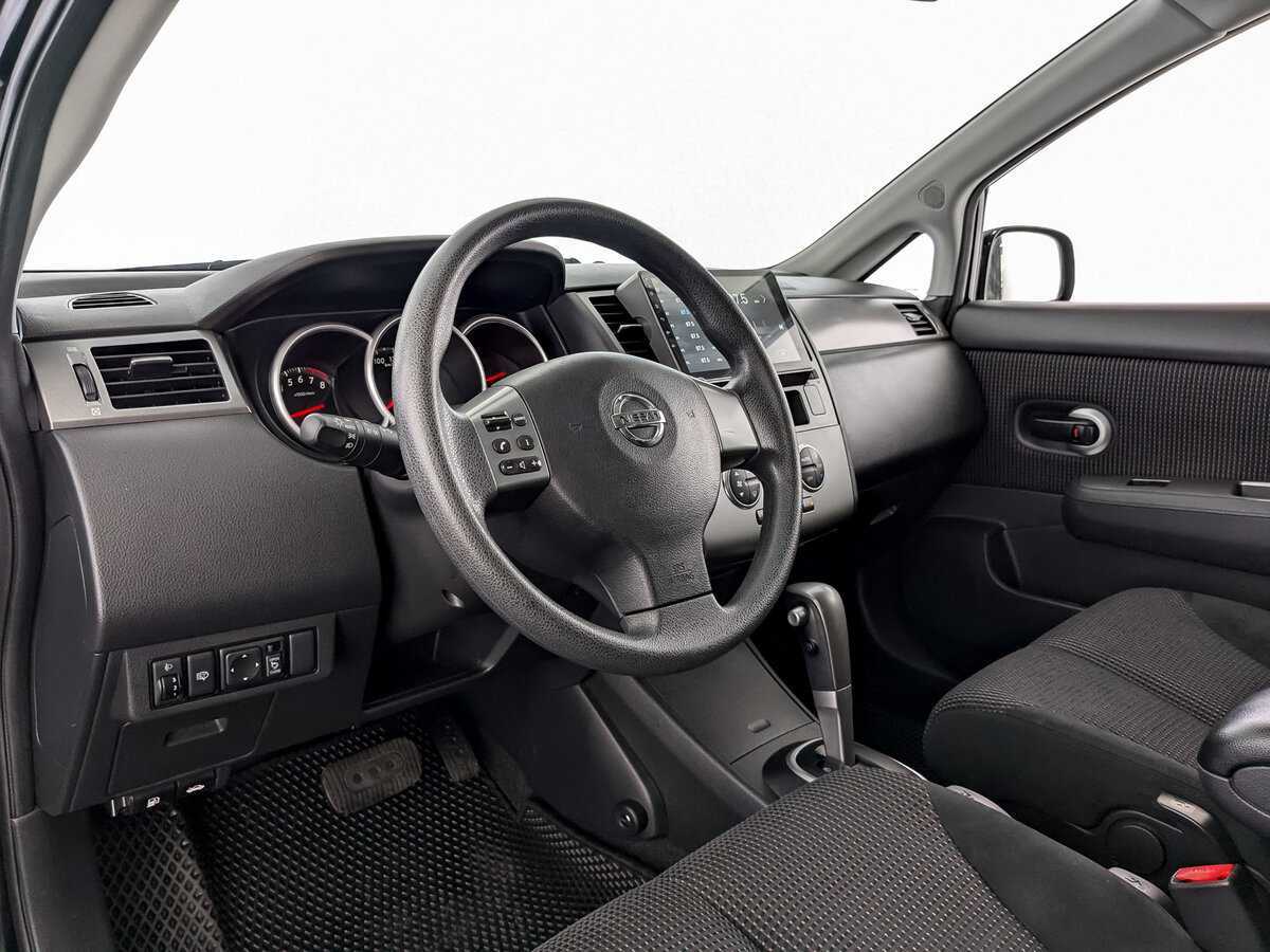 Nissan Tiida 2013 года с пробегом. Фото: #13
