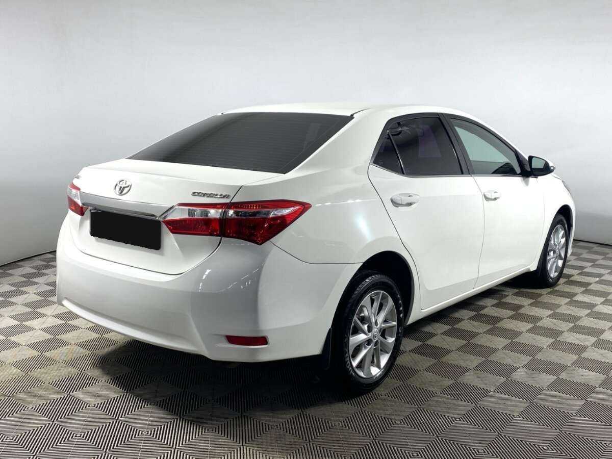 Toyota Corolla 2013 года с пробегом. Фото: #4