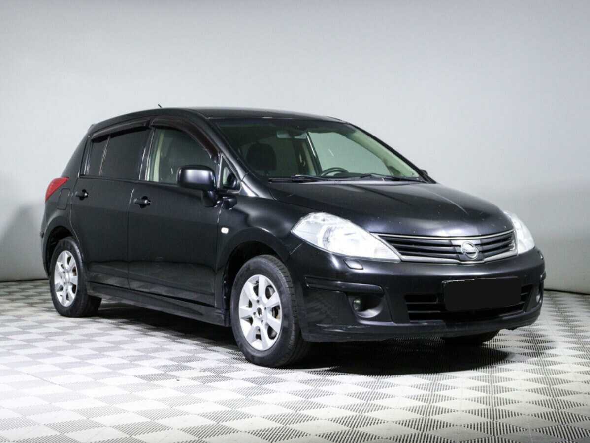Nissan Tiida 2013 года с пробегом. Фото: #2