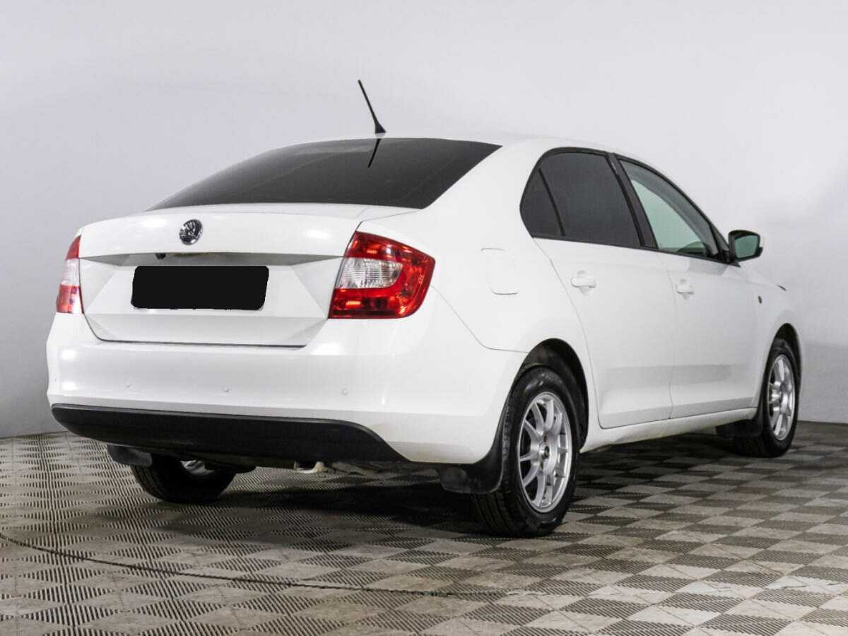 Skoda Rapid 2014 года с пробегом. Фото: #4