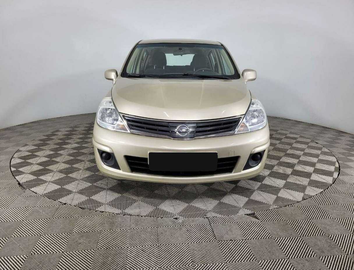 Nissan Tiida 2013 года с пробегом. Фото: #1