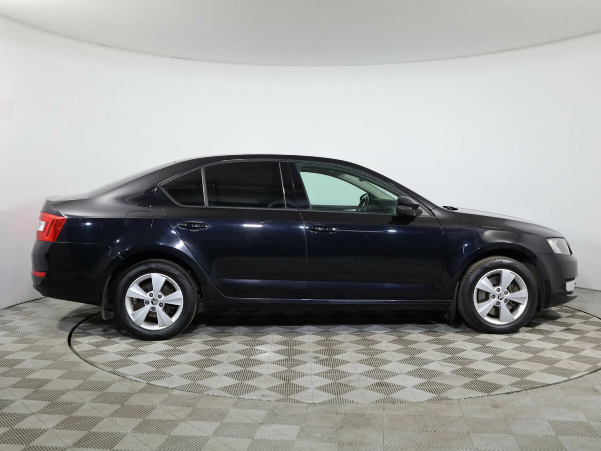 Skoda Octavia 2013 года с пробегом. Фото: #5
