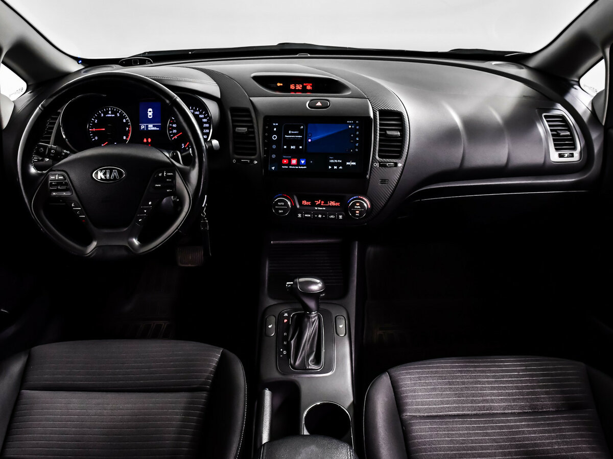 Kia Cerato 2013 года с пробегом. Фото: #11