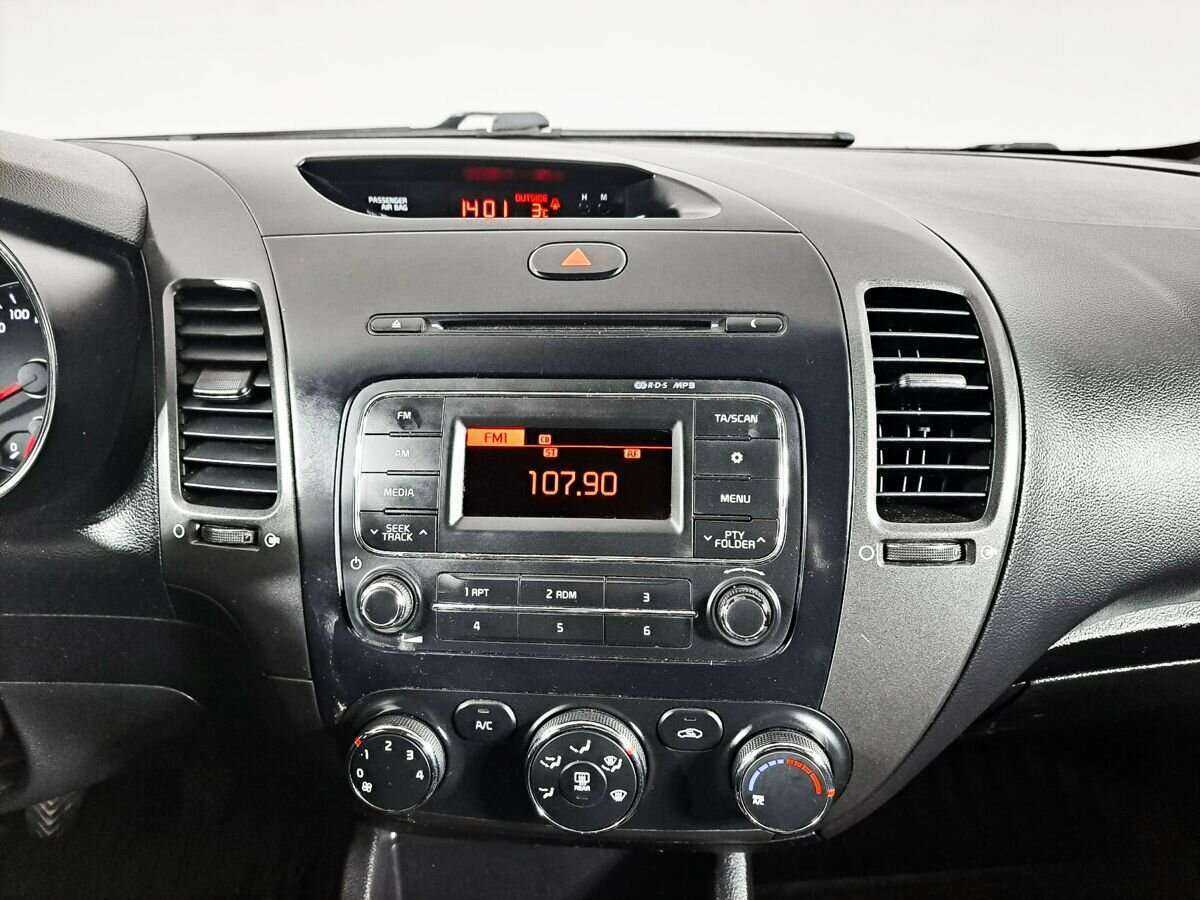 Kia Cerato 2013 года с пробегом. Фото: #10