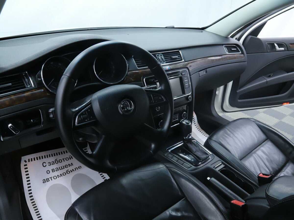 Skoda Superb 2013 года с пробегом. Фото: #8