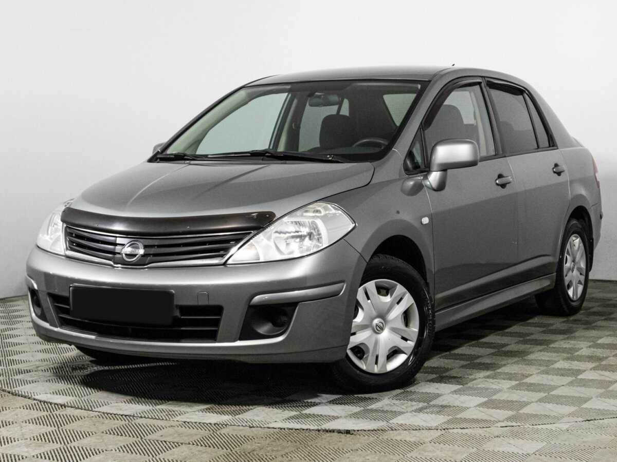 Nissan Tiida 2013 года с пробегом. Посмотреть фото