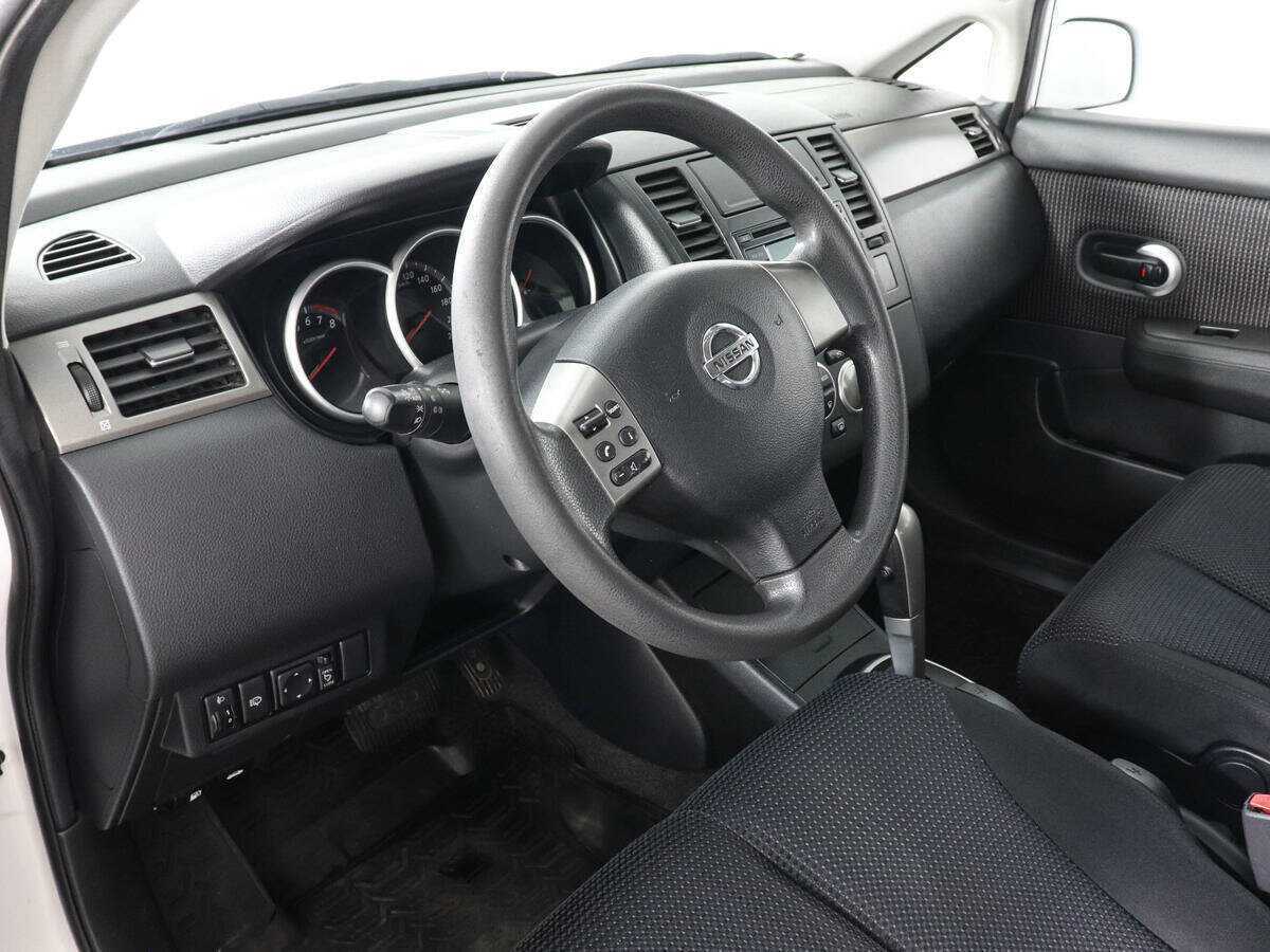 Nissan Tiida 2013 года с пробегом. Фото: #8
