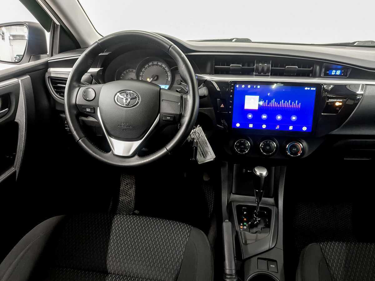 Toyota Corolla 2014 года с пробегом. Фото: #24