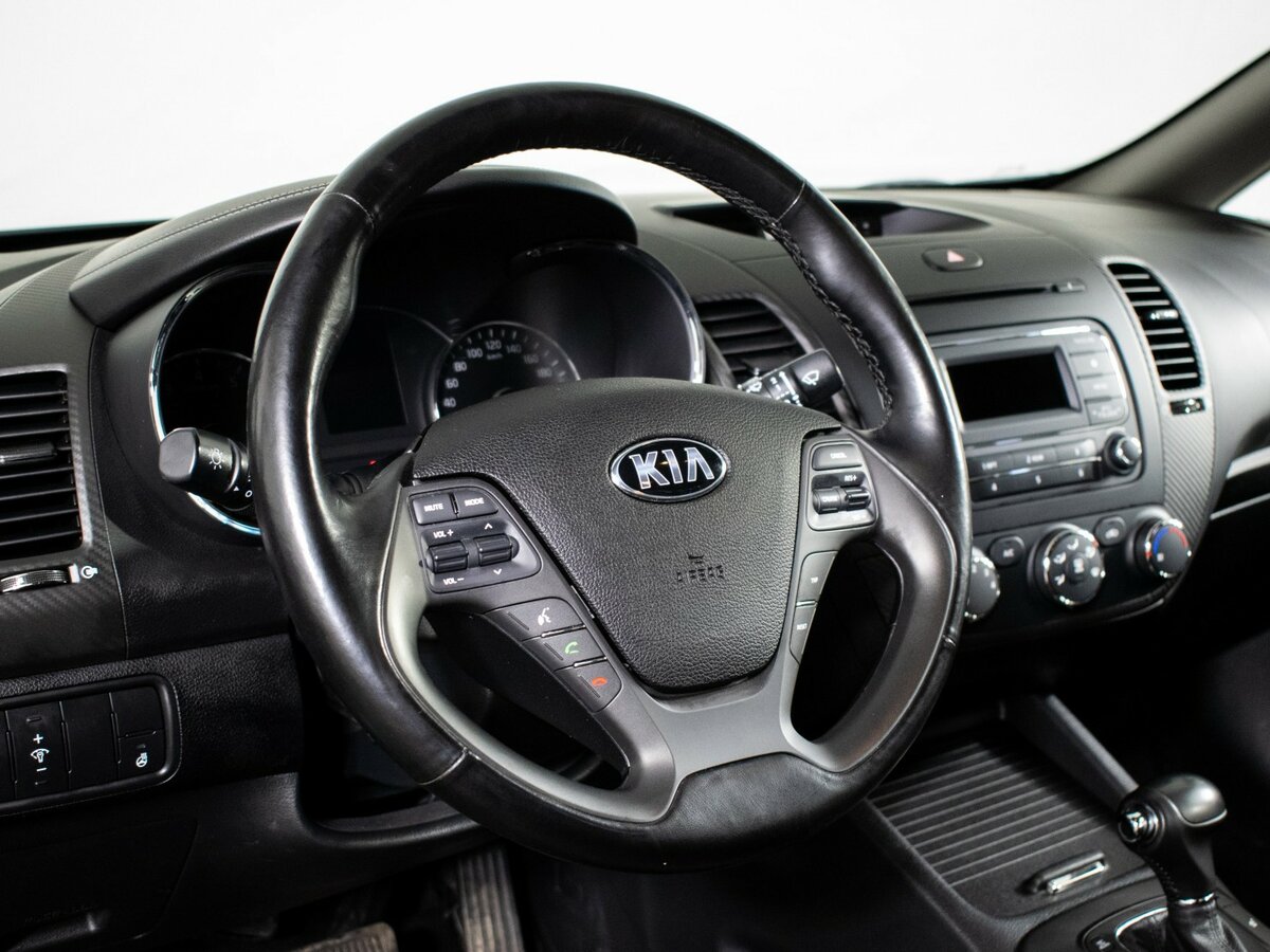 Kia Cerato 2015 года с пробегом. Фото: #11
