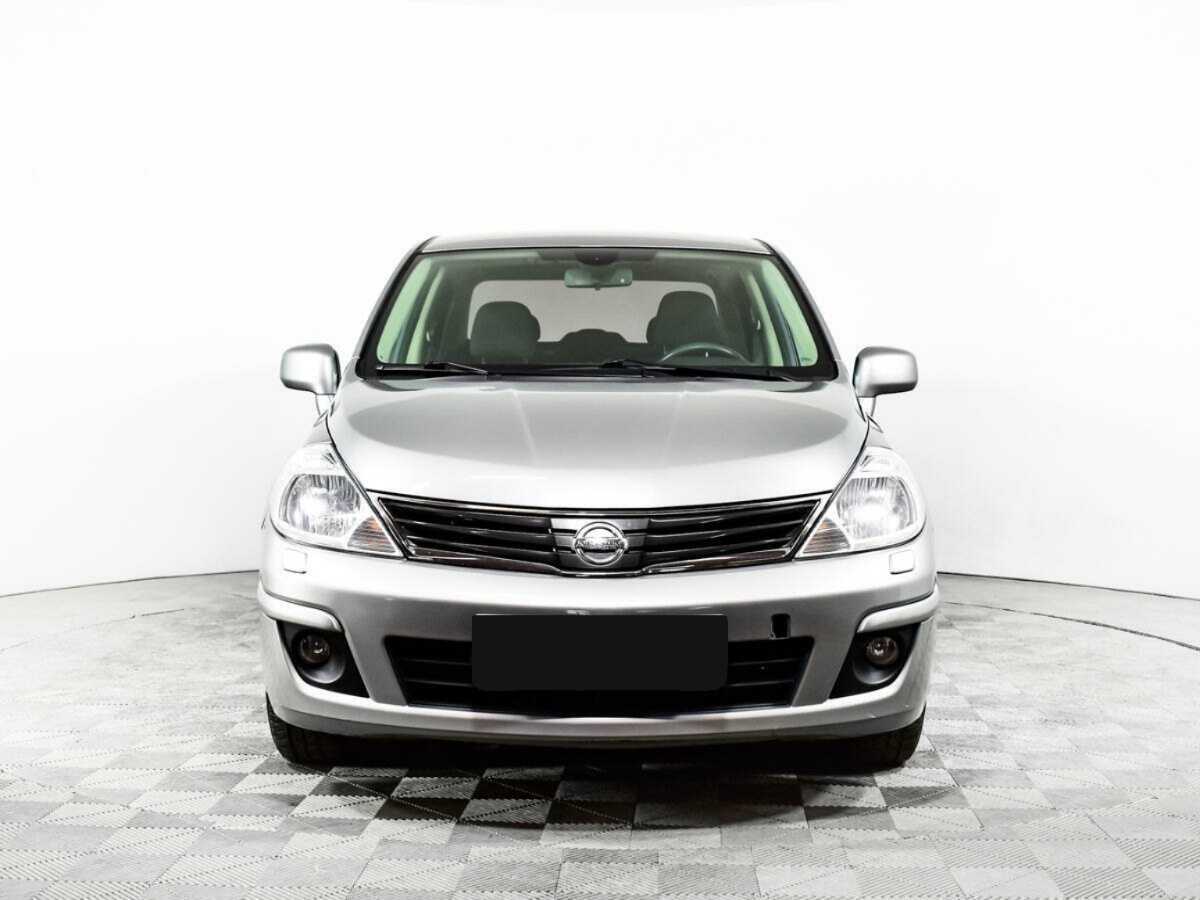 Nissan Tiida 2013 года с пробегом. Фото: #1