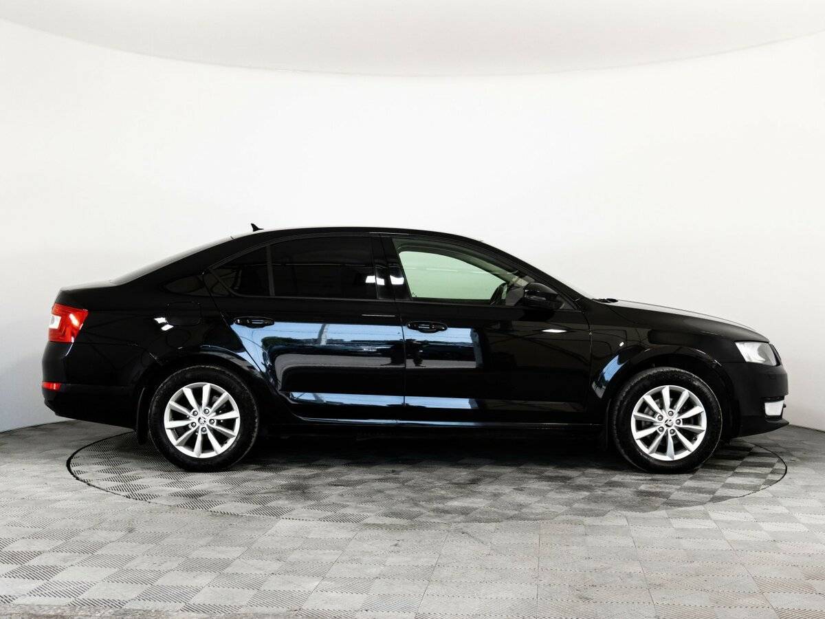Skoda Octavia 2013 года с пробегом. Фото: #3