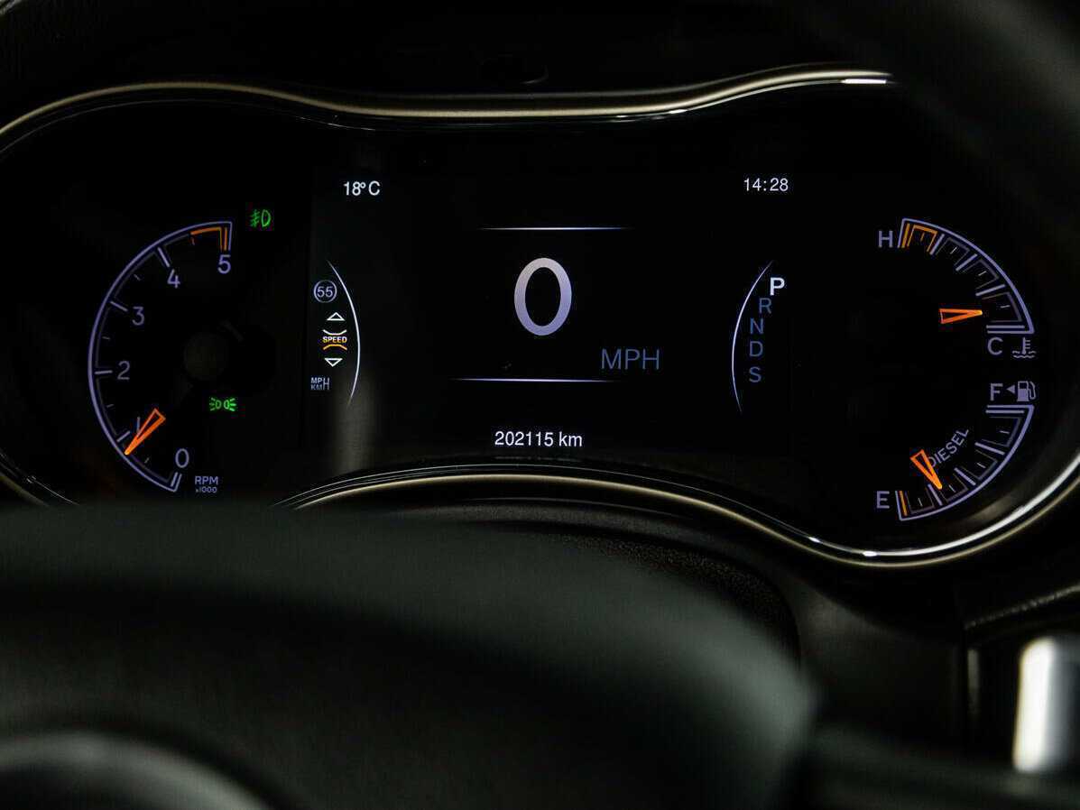 Jeep Grand Cherokee 2013 года с пробегом. Фото: #11