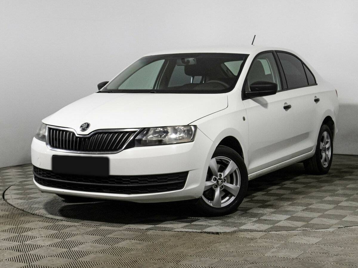 Skoda Rapid 2015 года с пробегом. Посмотреть фото
