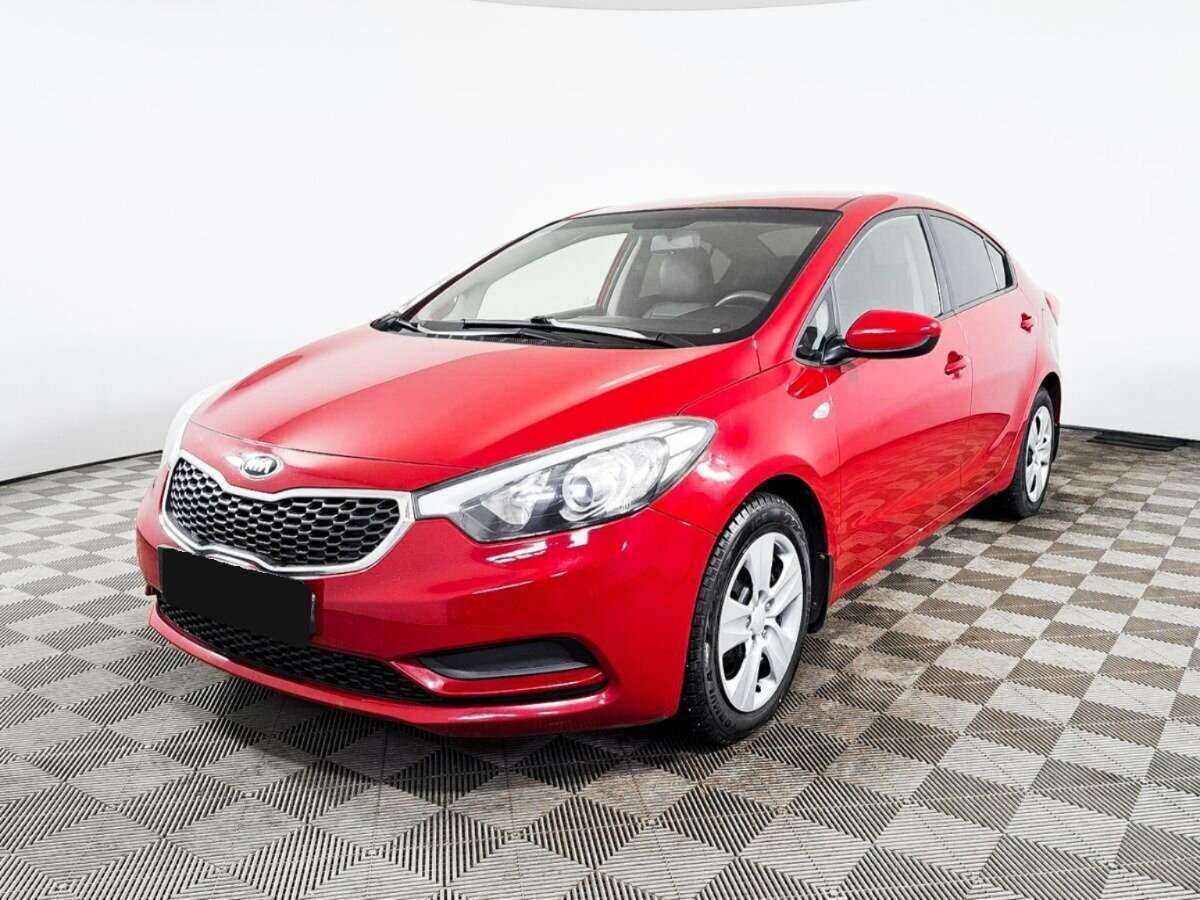Kia Cerato 2013 года с пробегом. Посмотреть фото