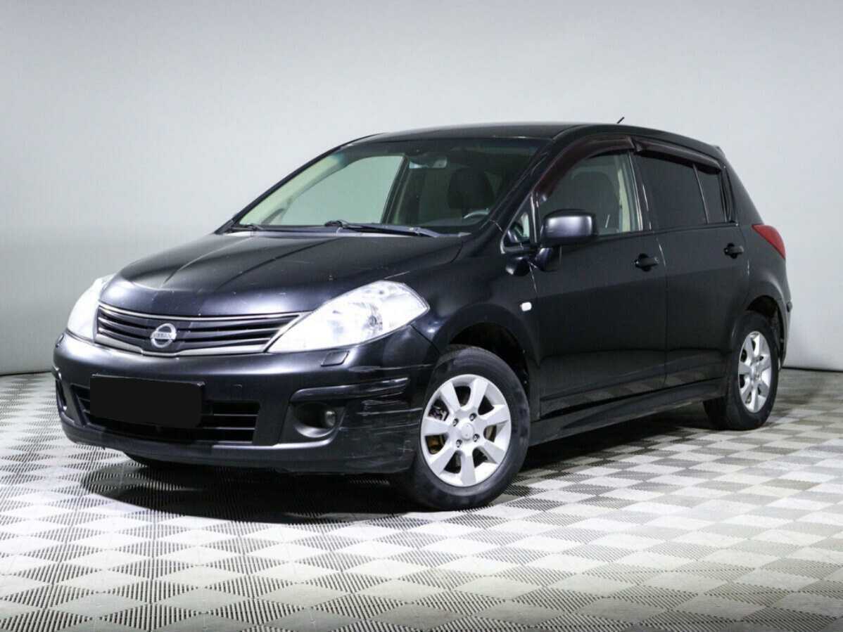 Nissan Tiida 2013 года с пробегом. Фото: #0