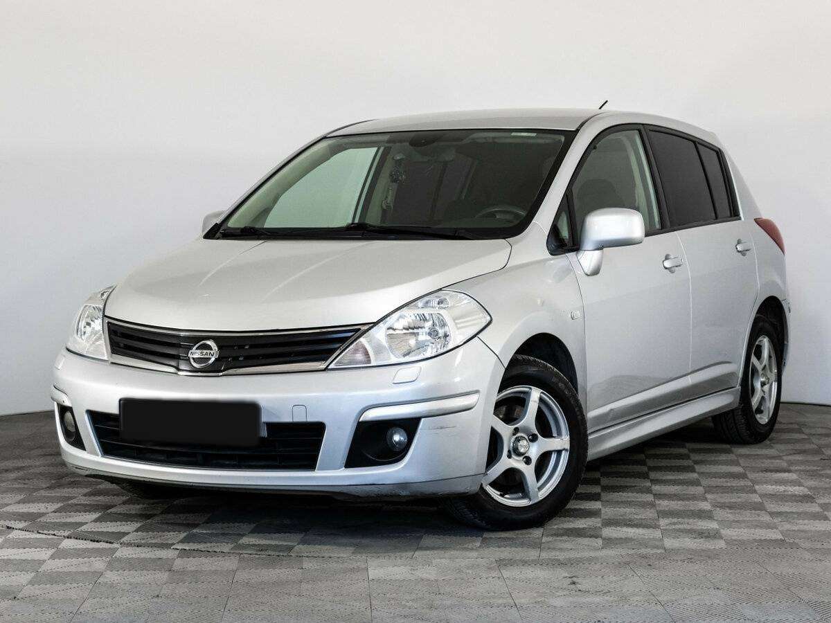 Nissan Tiida 2013 года с пробегом. Фото: #0