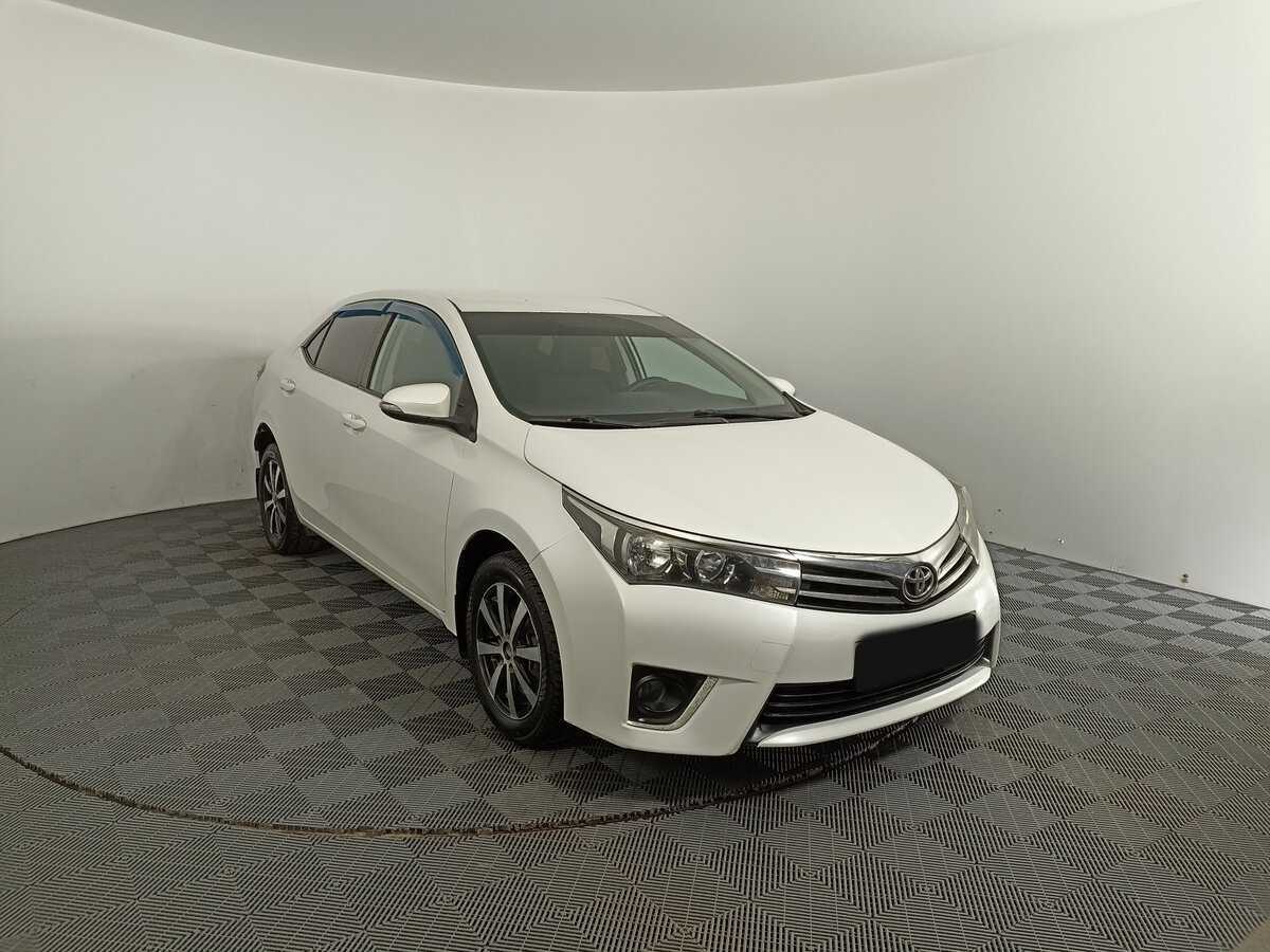 Toyota Corolla 2013 года с пробегом. Фото: #2