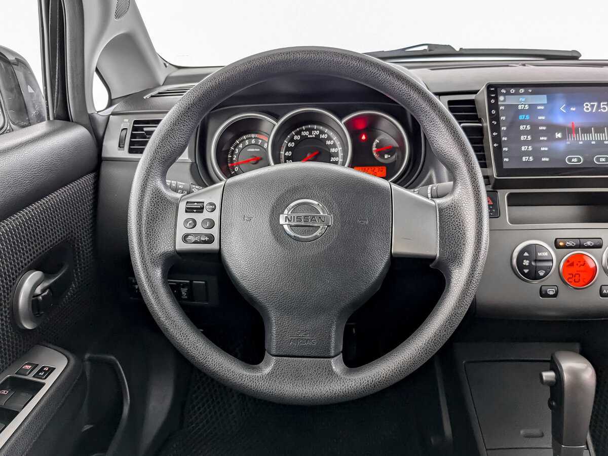 Nissan Tiida 2013 года с пробегом. Фото: #16