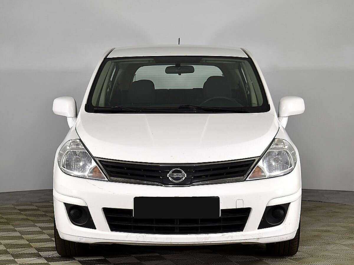 Nissan Tiida 2013 года с пробегом. Фото: #2