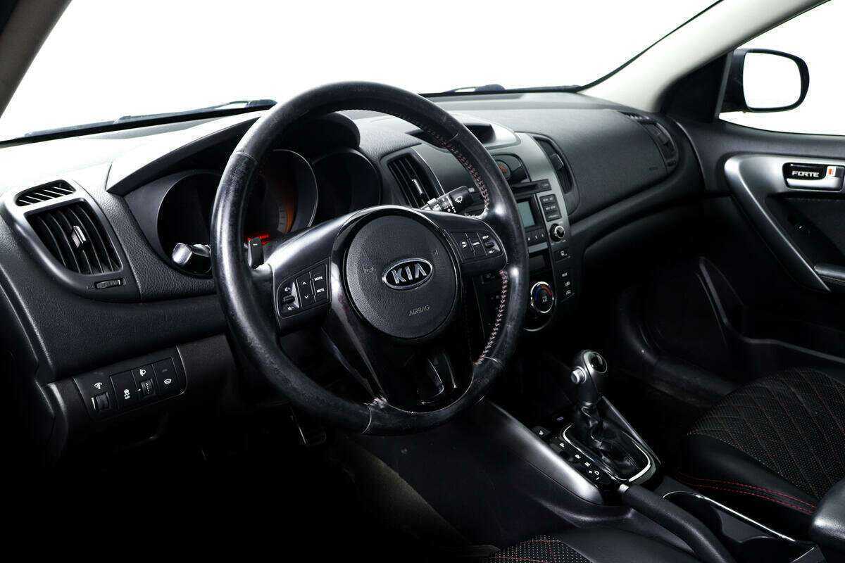 Kia Cerato 2012 года с пробегом. Фото: #12