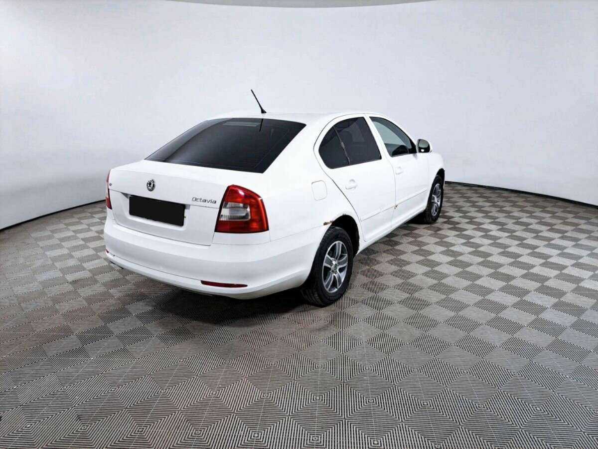 Skoda Octavia 2012 года с пробегом. Фото: #4
