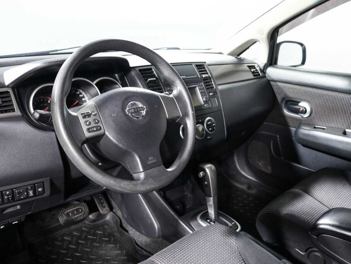 Nissan Tiida 2013 года с пробегом. Фото: #11