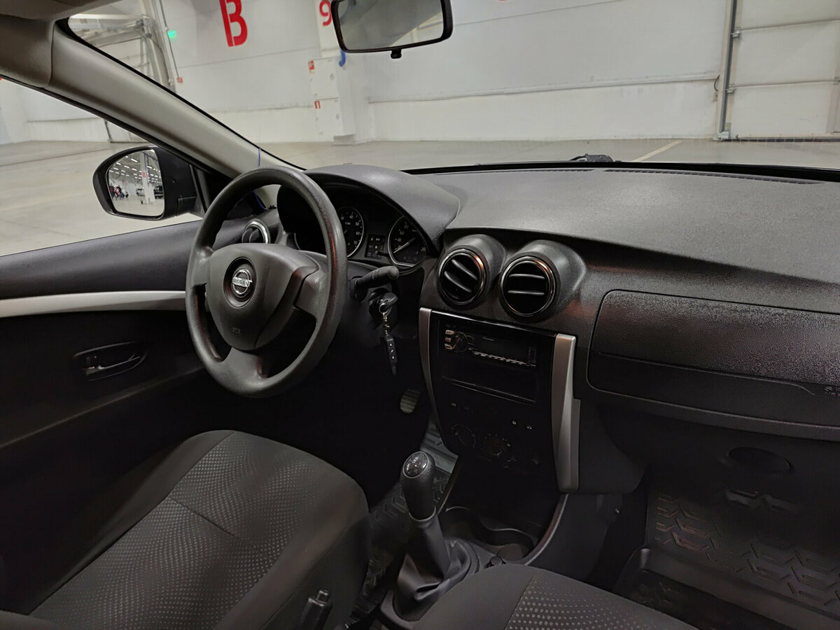 Nissan Almera 2015 года с пробегом. Фото: #9