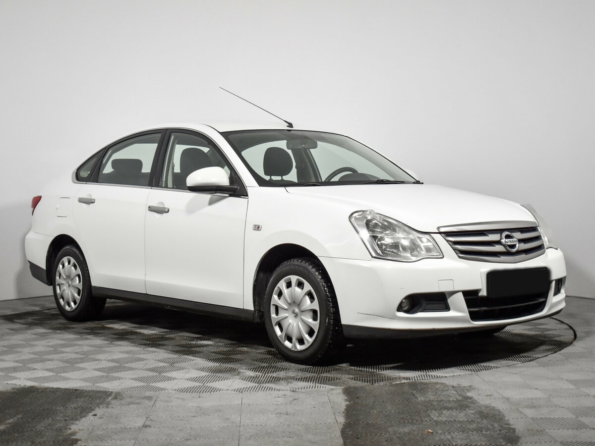 Nissan Almera 2013 года с пробегом. Фото: #2
