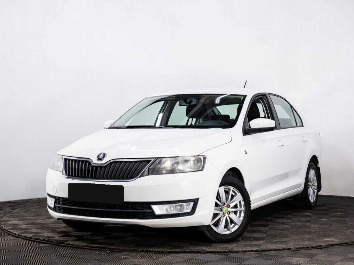 Skoda Rapid 2015 года с пробегом. Посмотреть фото