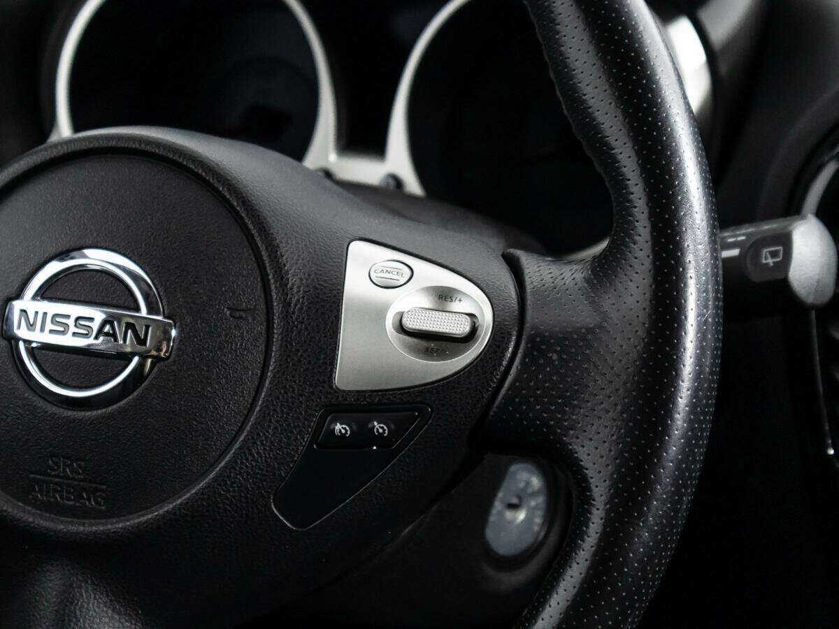 Nissan Juke 2014 года с пробегом. Фото: #18