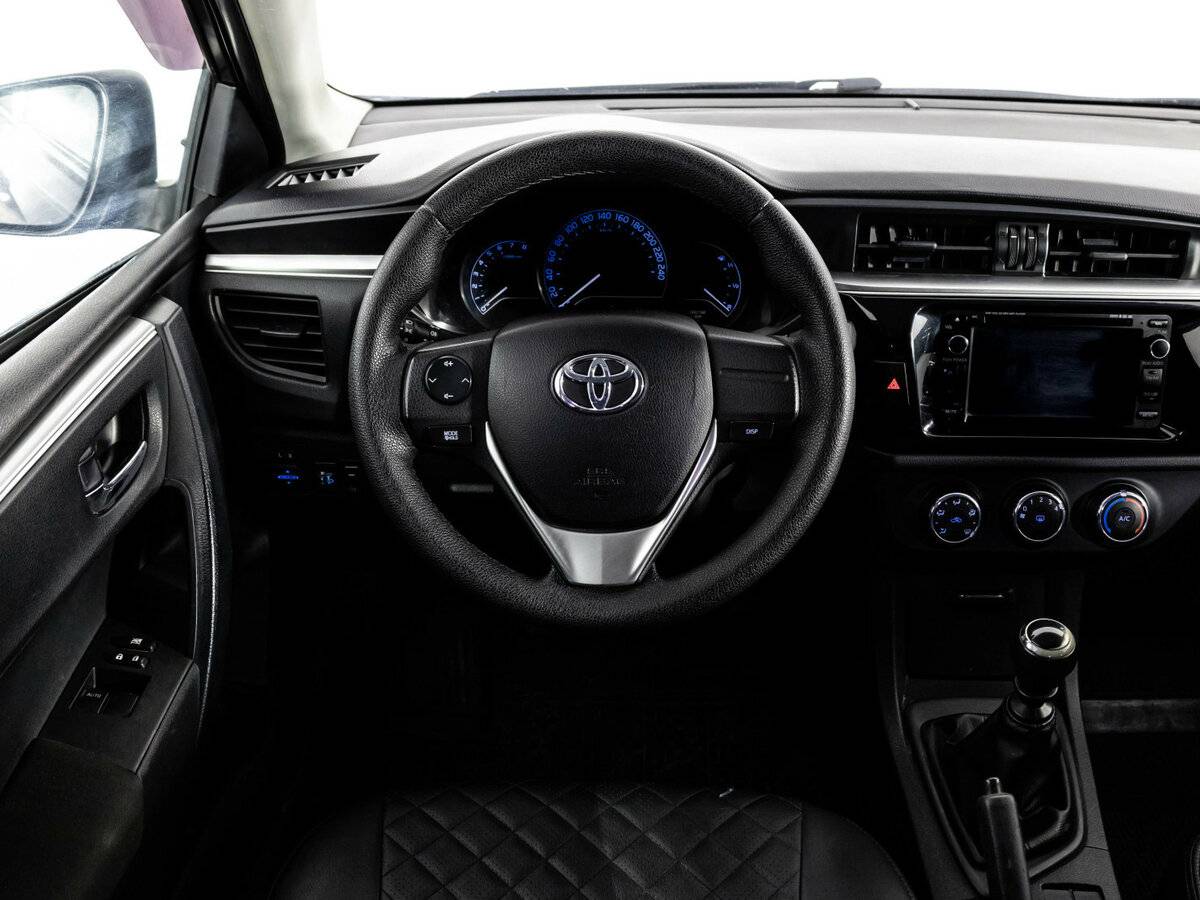 Toyota Corolla 2014 года с пробегом. Фото: #8