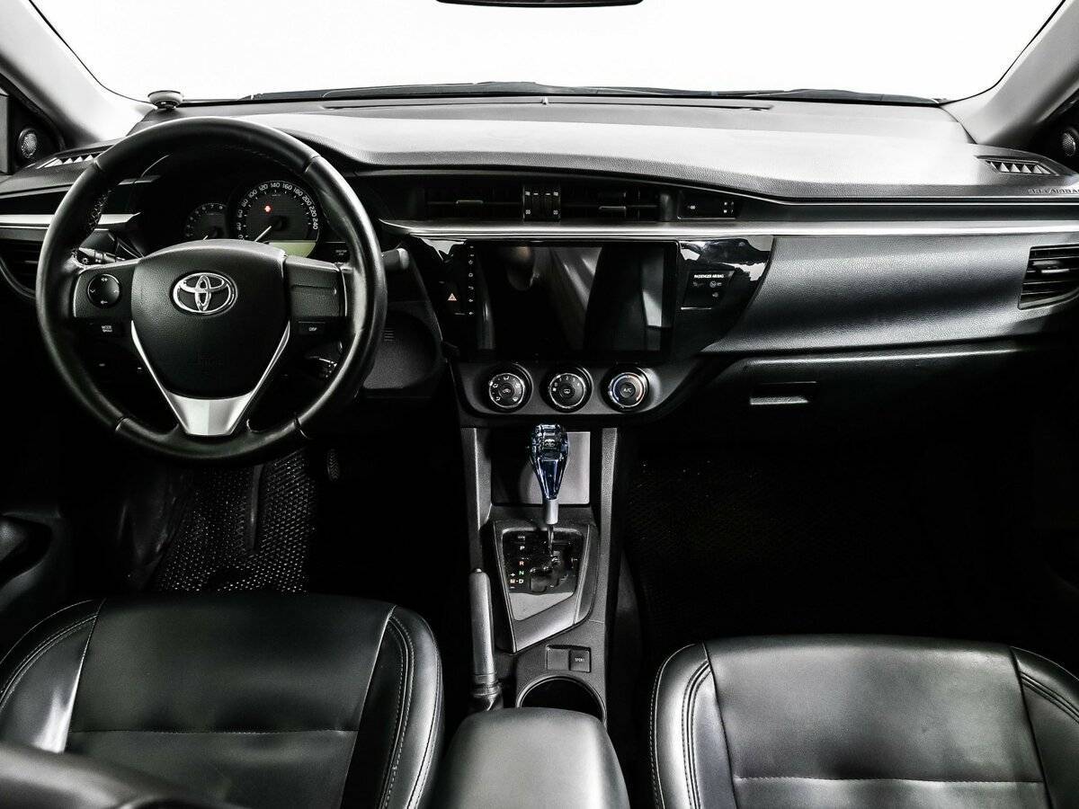 Toyota Corolla 2013 года с пробегом. Фото: #10